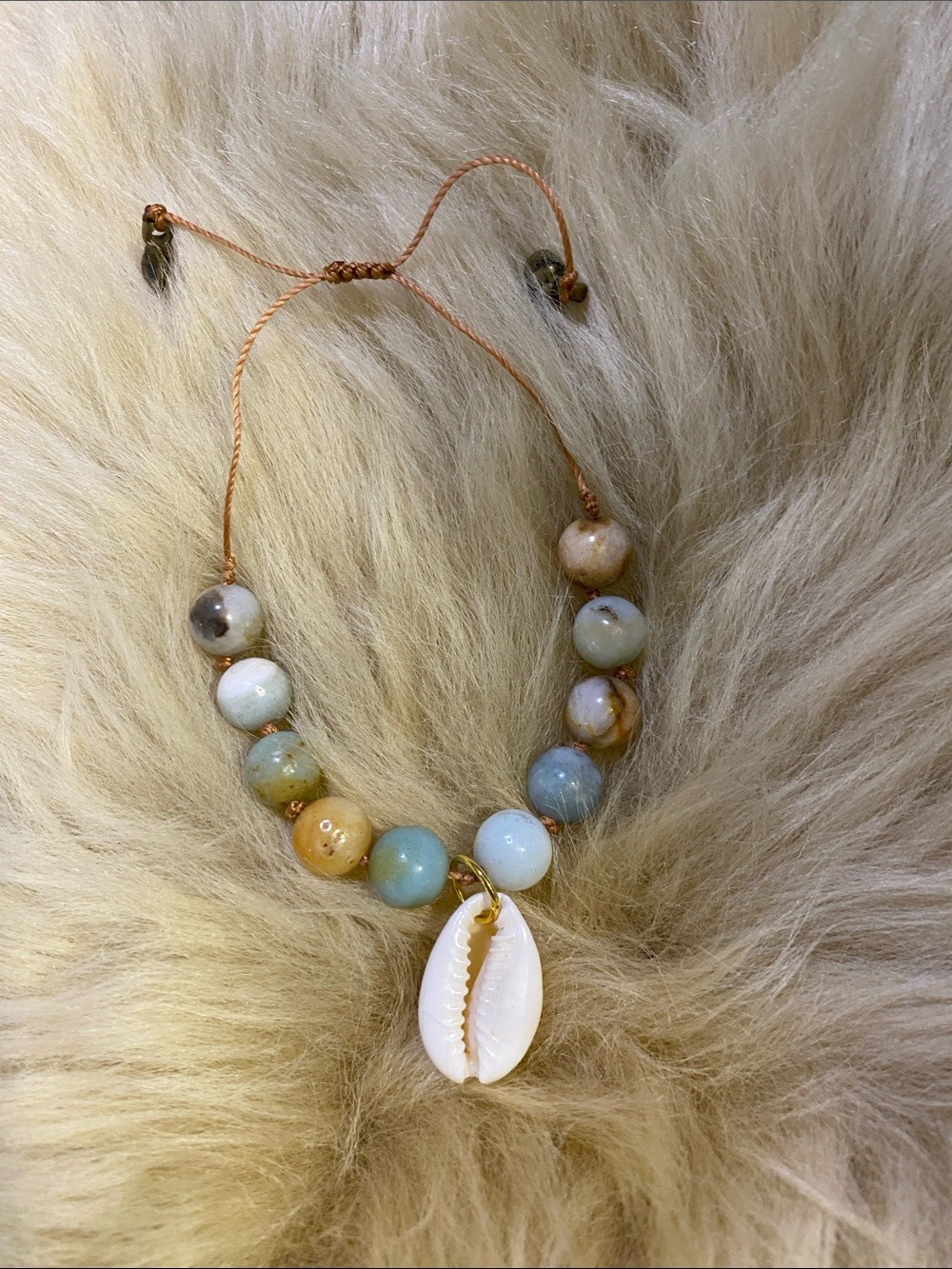 Hand Crafted Aqua, Tan & White Beaded Bracelet with Cowrie Charm